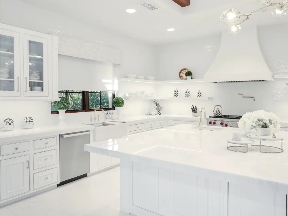 Bright kitchen renovation with a large white island and custom cabinetry.